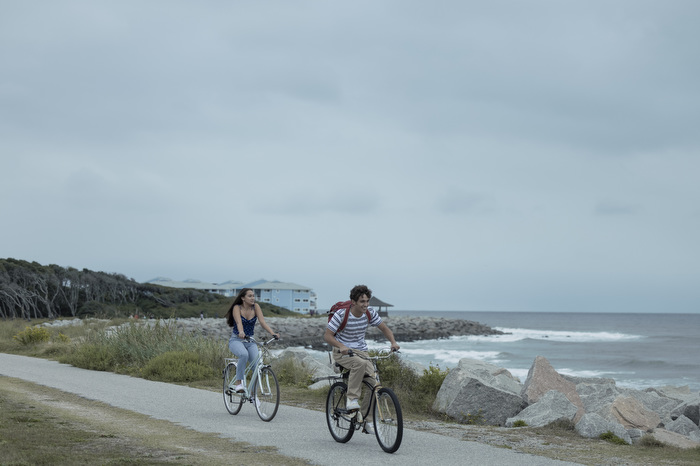 two teenagers biking along a beach path, The Summer I Turned Pretty filmed in Wilmington