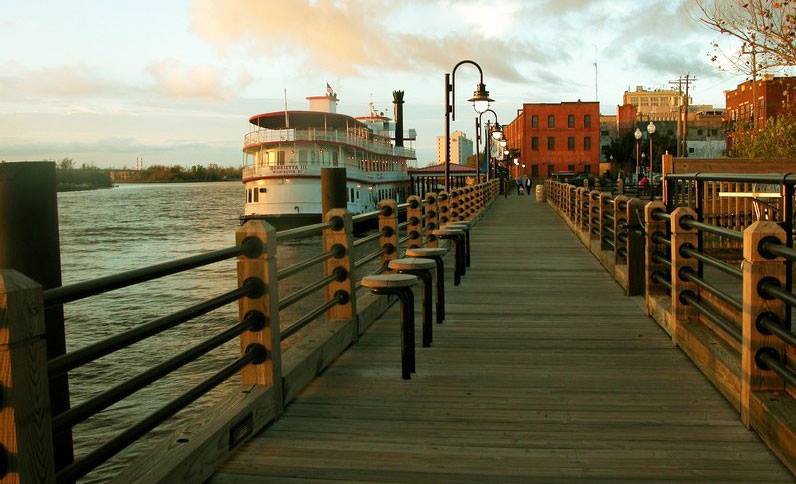 downtown wilmington's riverwalk at sunset