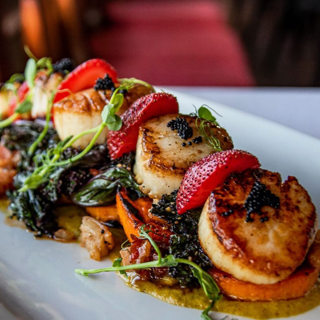 Scallop dish with herbs and strawberries, Jerry's Food, Wine and Spirits, date night spot in Wrightsville Beach