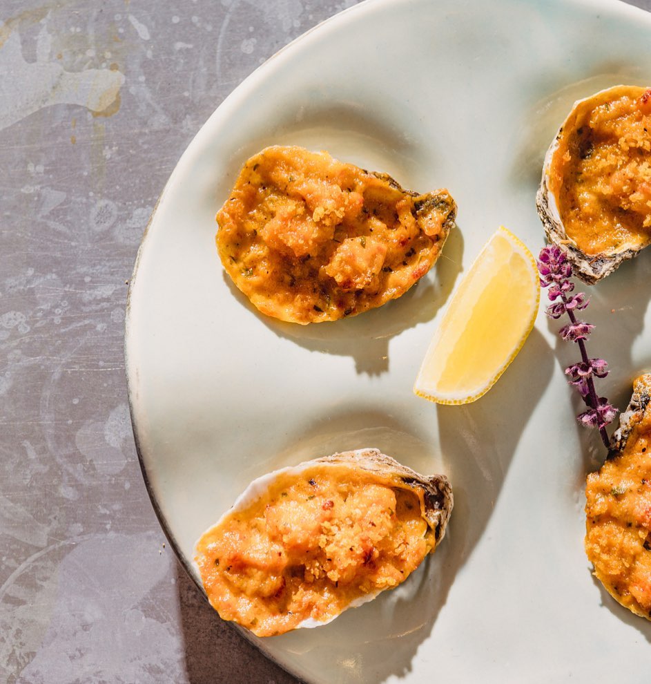 Hollandaise oysters at Seabird paired with a lemon wedge