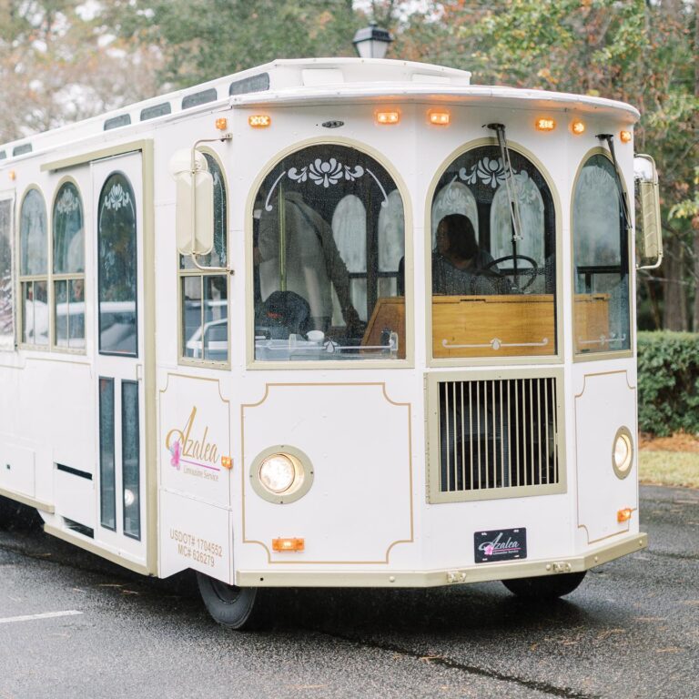 Front of white and gold trolley, Azalea Limousine Service, Wilmington, NC